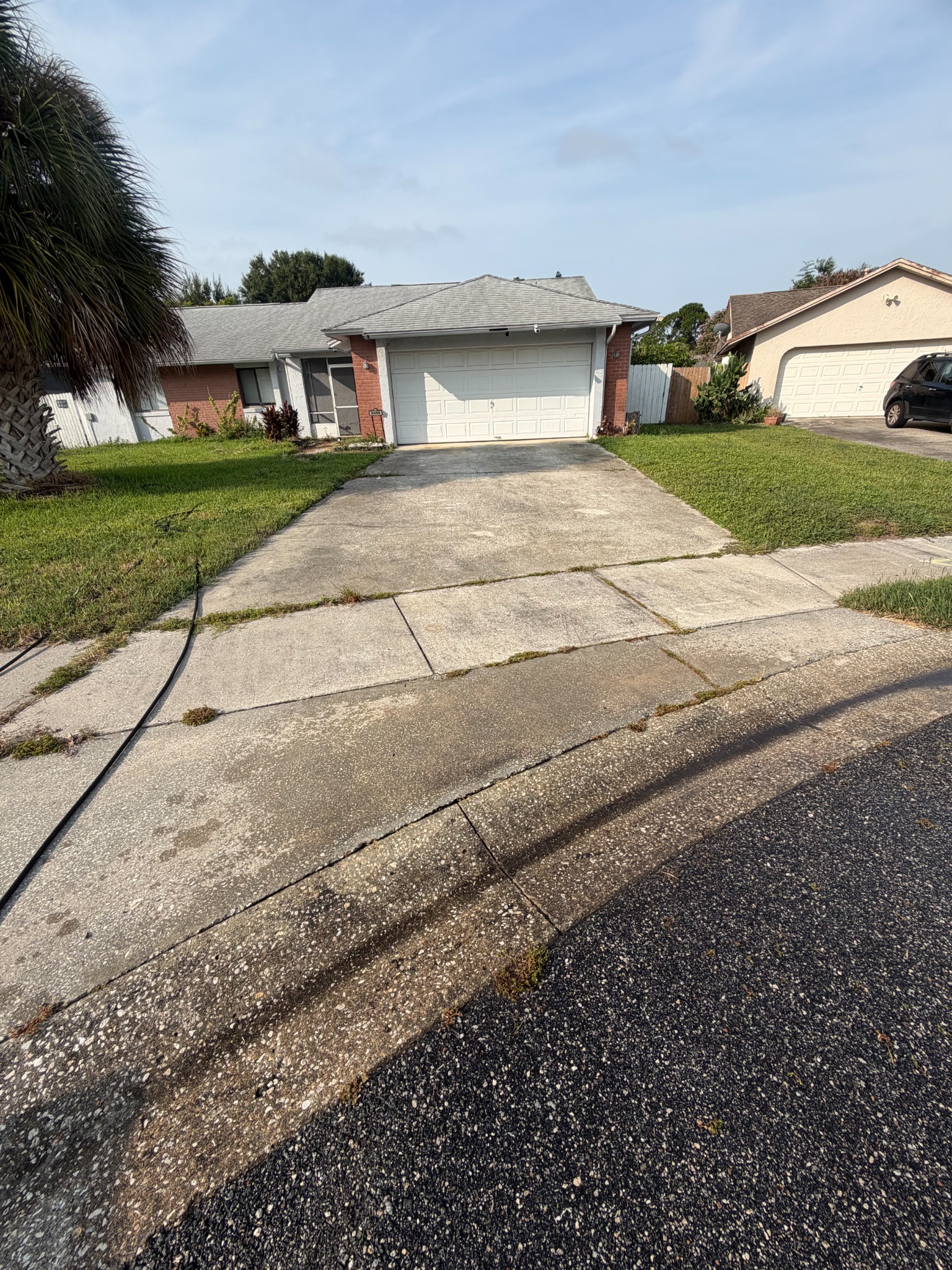 Dirty driveway before pressure washing